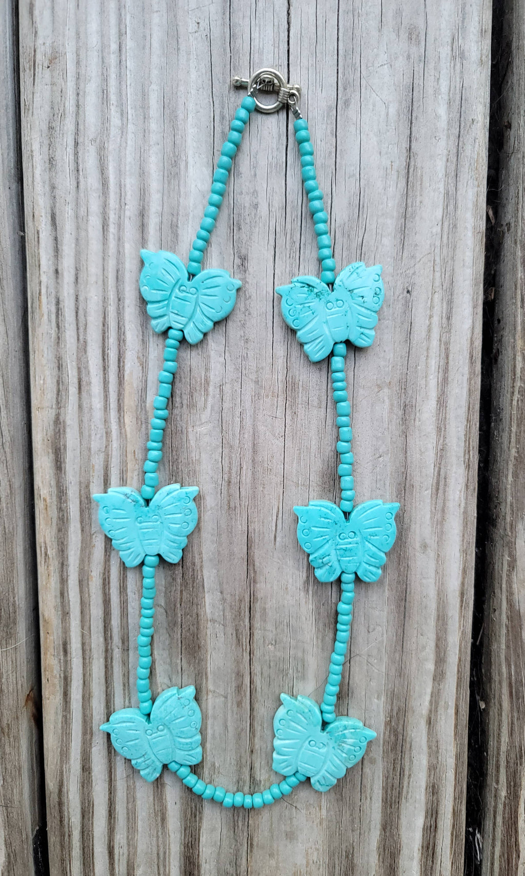 Handcarved Turquoise Howlite butterflies, glass beads