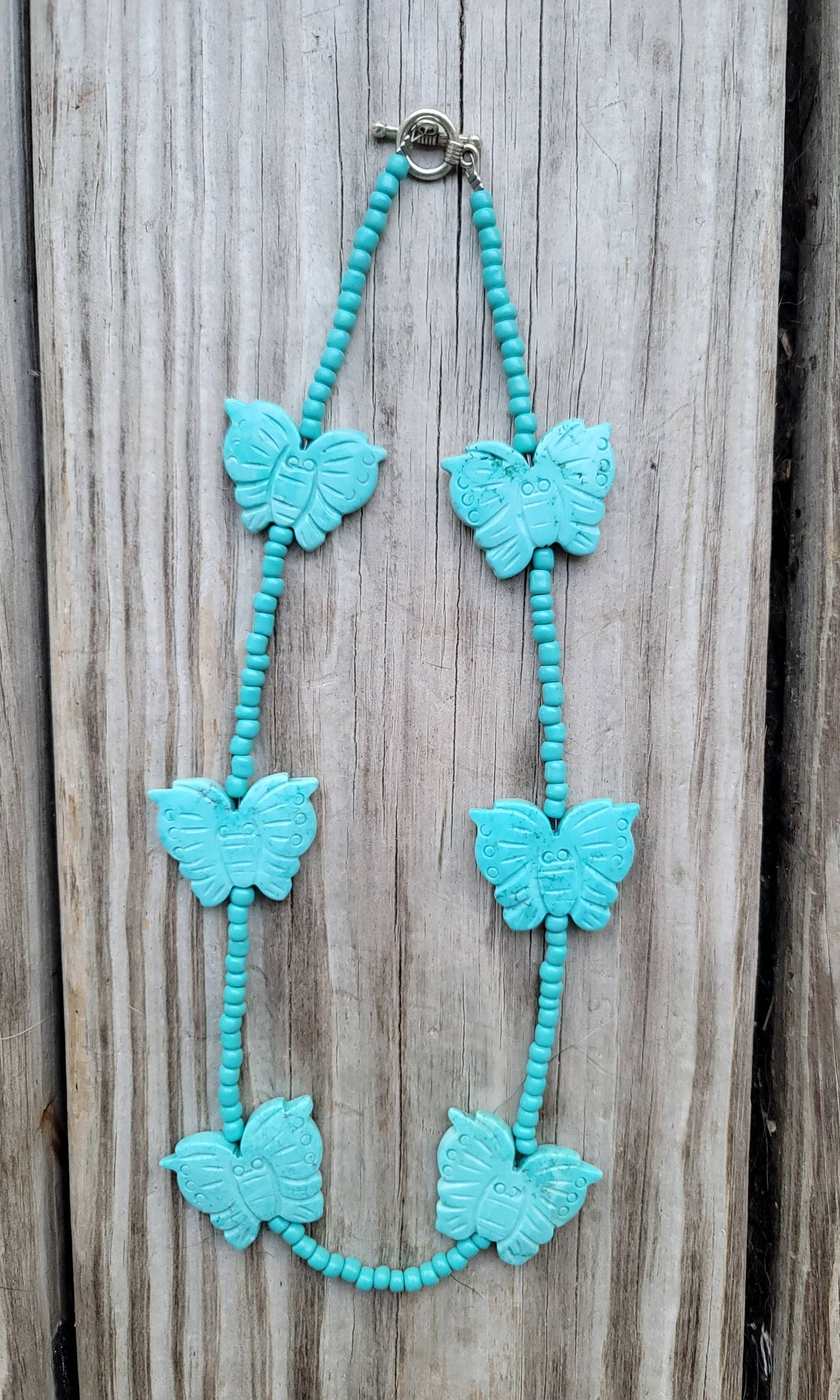 Handcarved Turquoise Howlite butterflies, glass beads