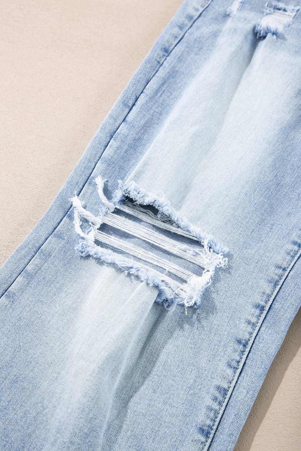 Blue Light Wash Distressed Jeans