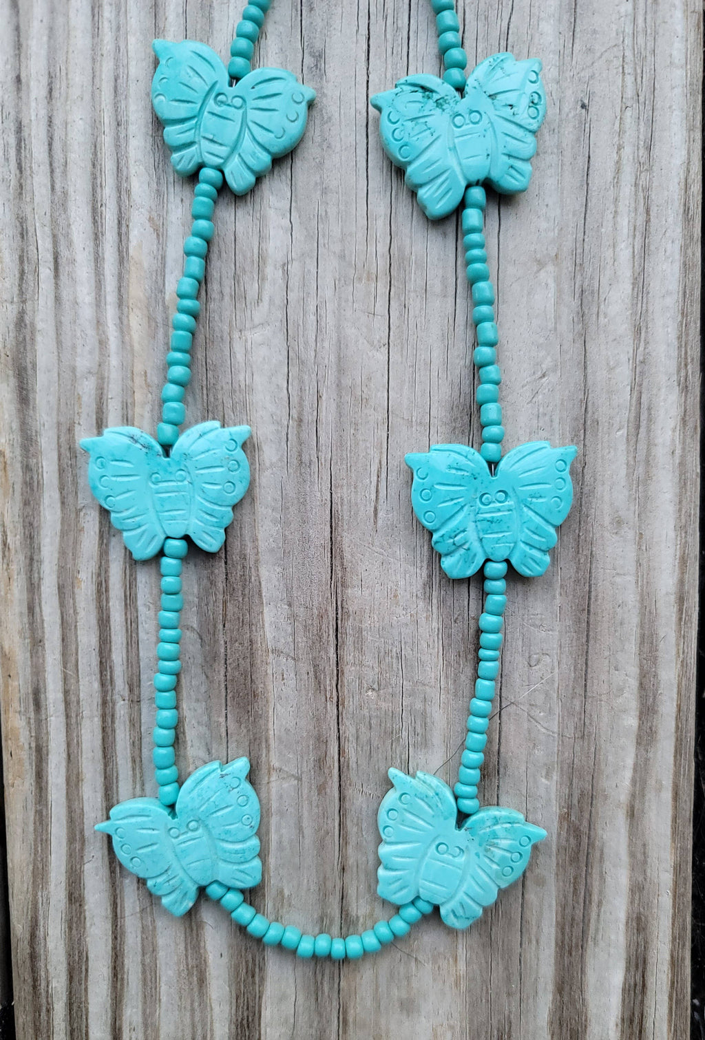 Handcarved Turquoise Howlite butterflies, glass beads