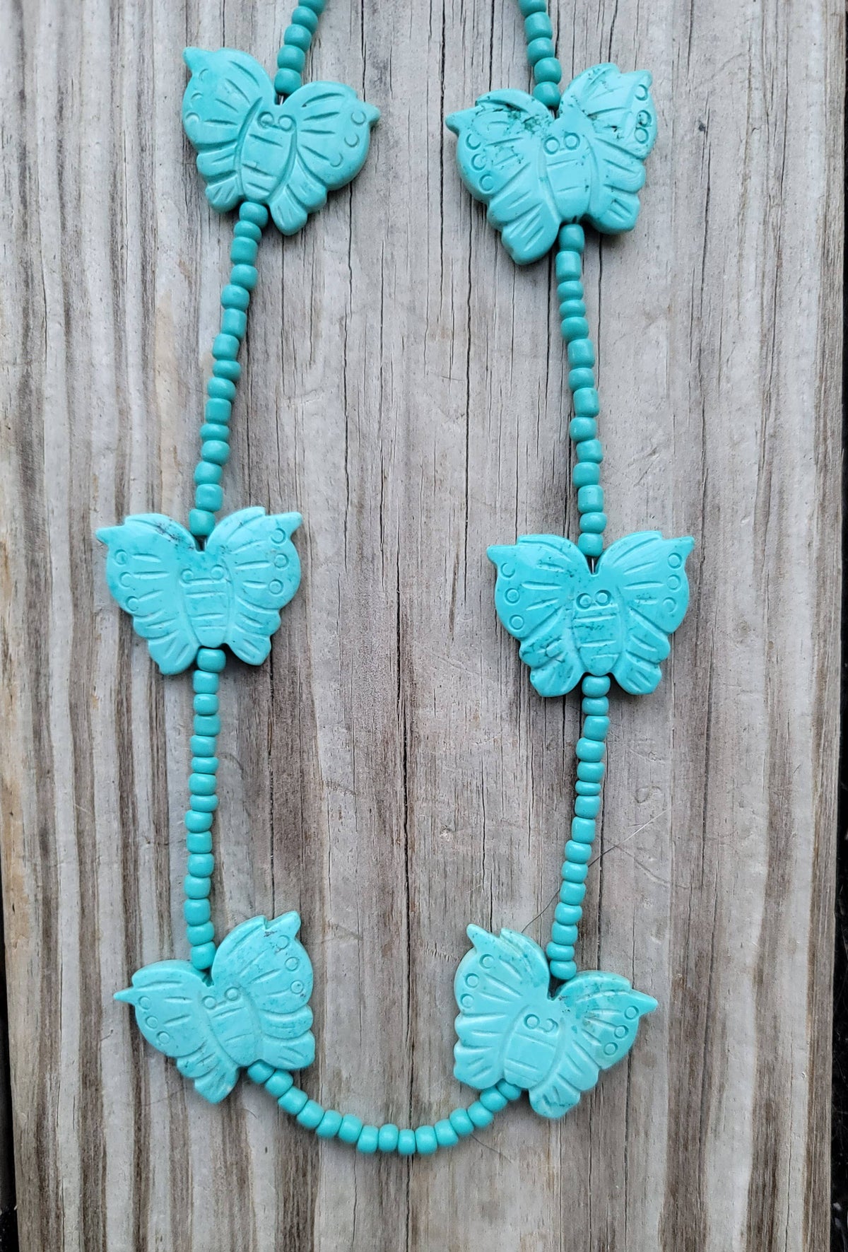 Handcarved Turquoise Howlite butterflies, glass beads