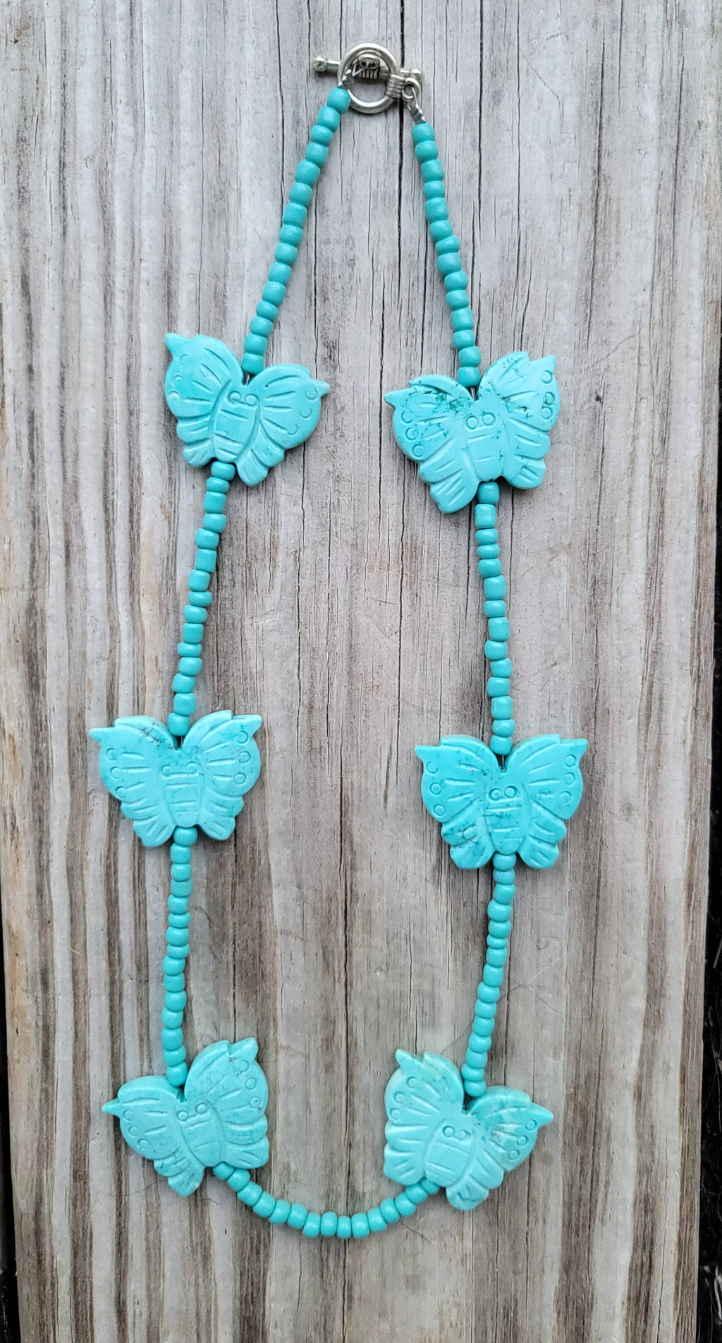 Handcarved Turquoise Howlite butterflies, glass beads