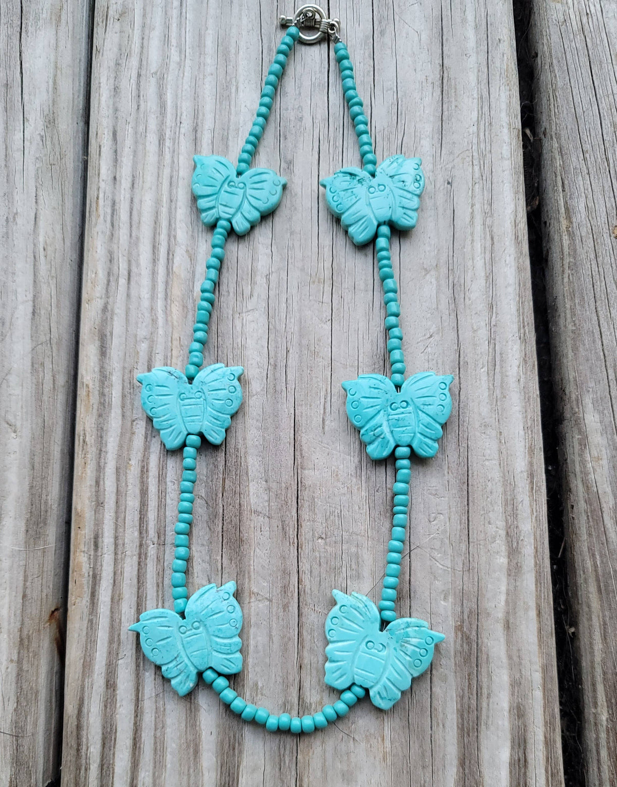 Handcarved Turquoise Howlite butterflies, glass beads