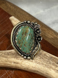 Turquoise Cabochon with metal flower ring